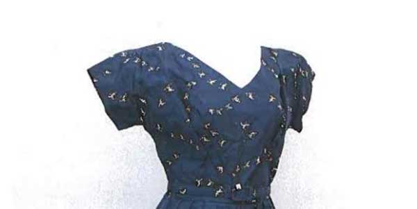 Blue floral dress worm by Flannery O'Connor.